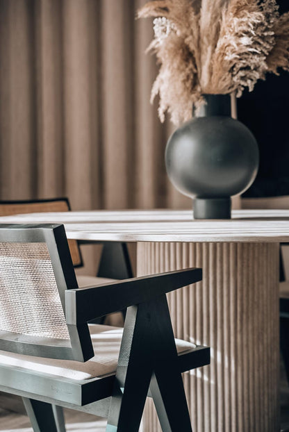 Travertine dining table with solid Fluted Base